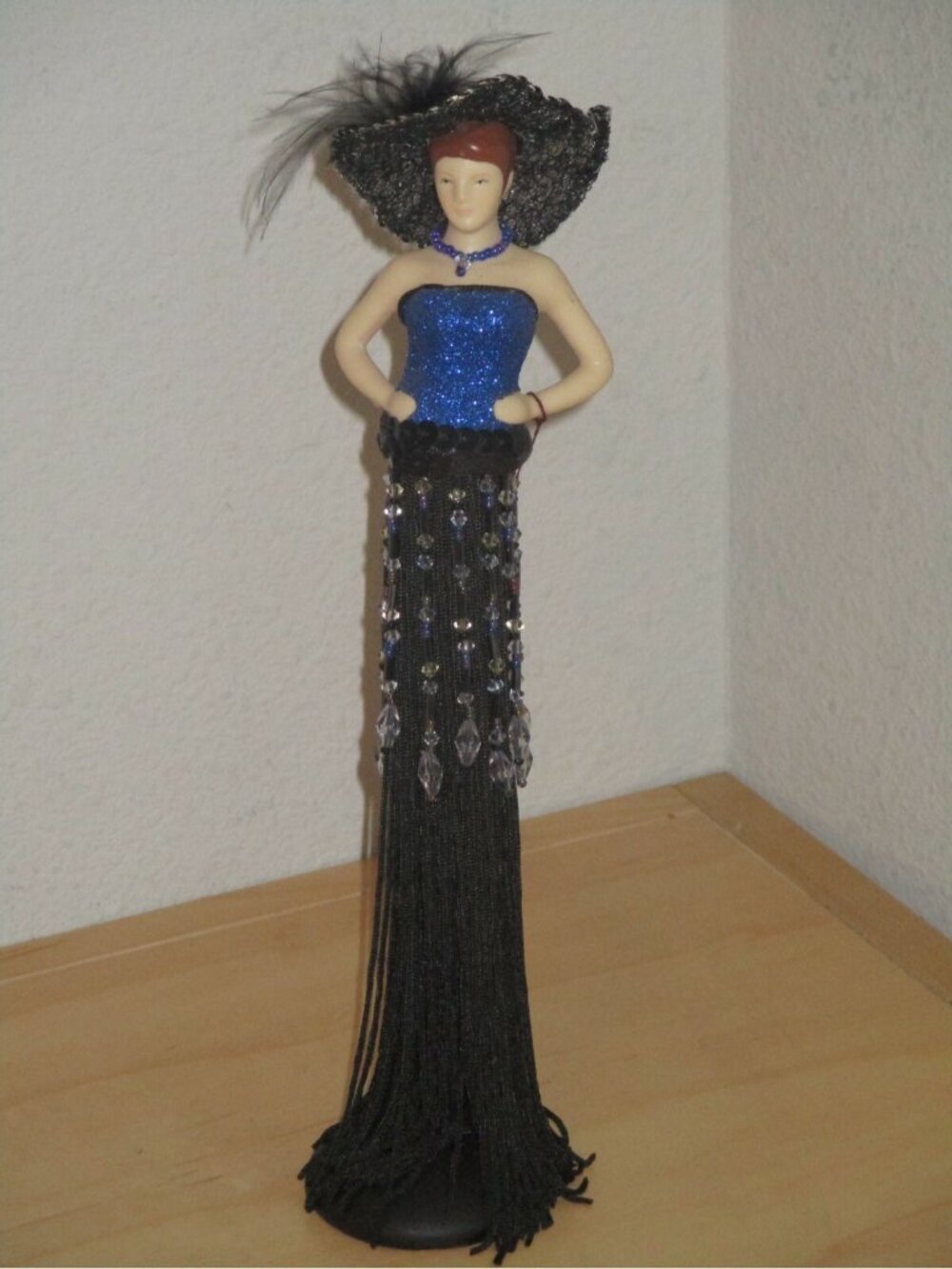 Putting on the Ritz Shiny Dark Blue Poly Resin Hand and Face Tassel Used Good